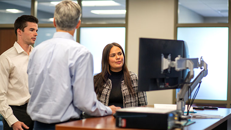 an intern discusses a deal with a PSRS/PEERS investment officer