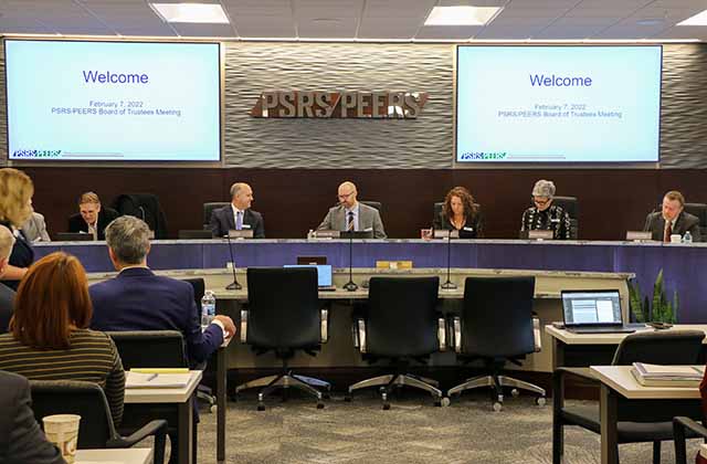 Board of Trustees Chair Jason Steliga and Executive Director Dearld Snider discuss the agenda at the February 7, 2022 Board of Trustees meeting