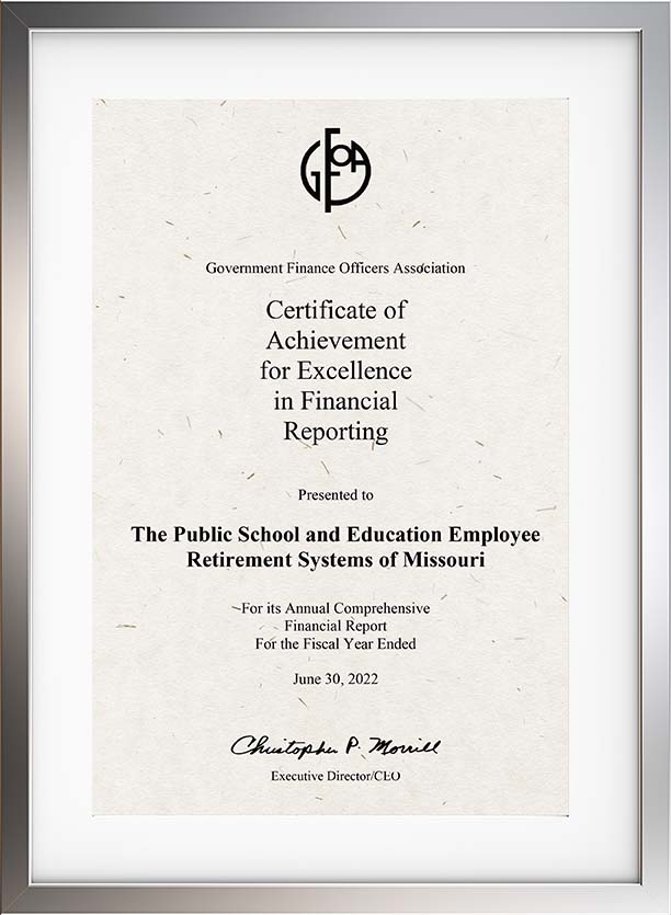 a photo of the GFOA award presented to PSRS/PEERS for the Systems' 2022 Annual Comprehensive Financial Report.