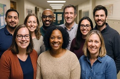 a group of teachers in a school hallway