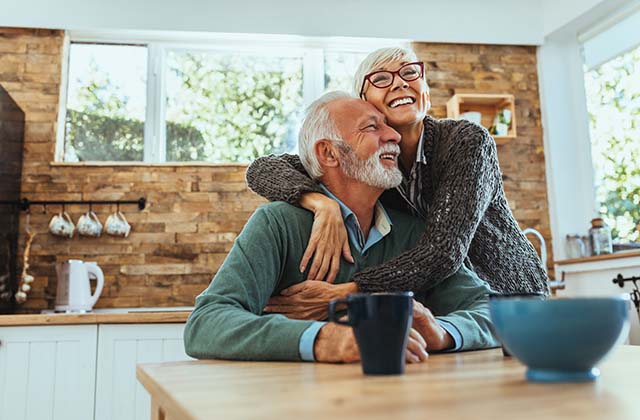 retired couple in kitchen